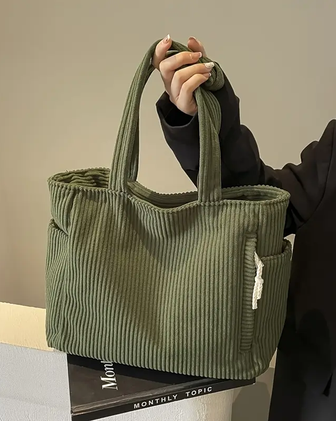 Edit – Ribbad toteväska med snodddetalj