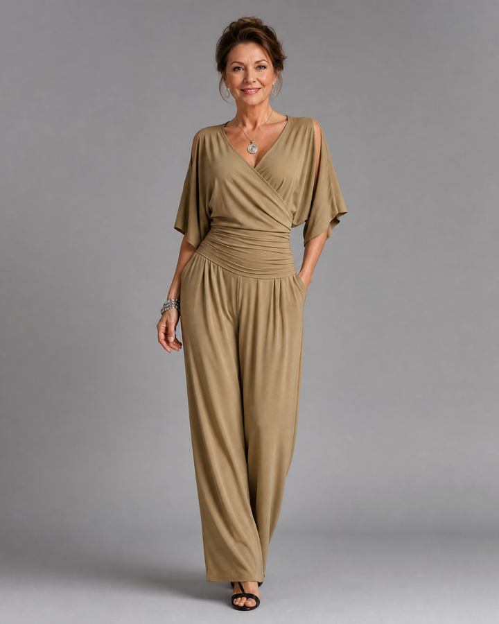 Tilda – Avslappnad overall med cold shoulder och omlottmidja