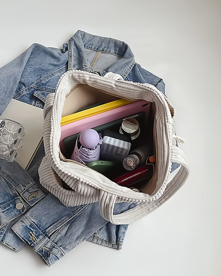 Edit – Ribbad toteväska med snodddetalj