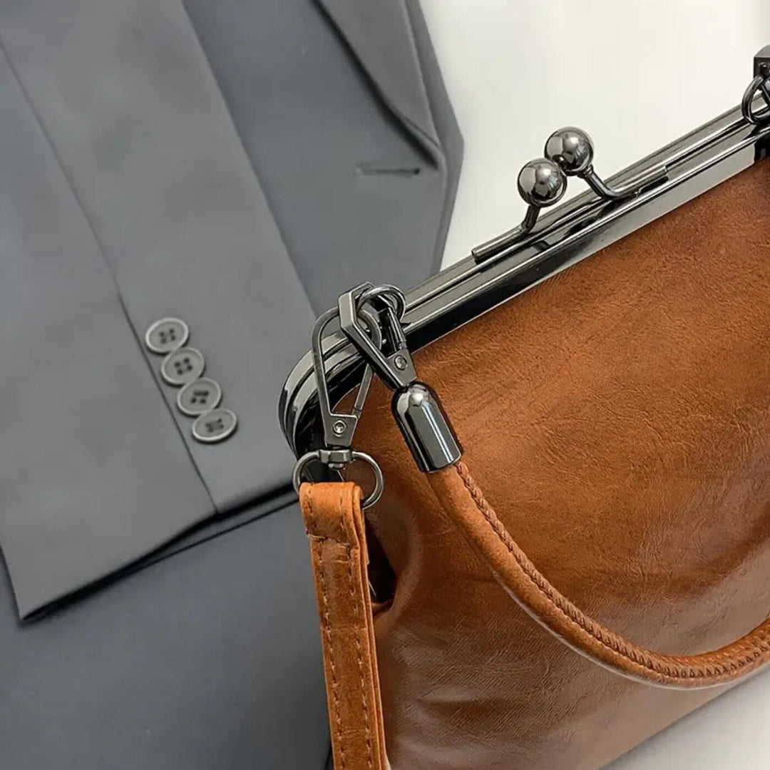 Rebecka – Vintage handväska med klicklås