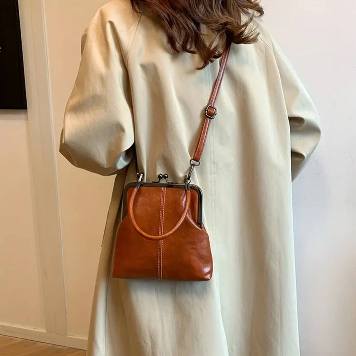 Rebecka – Vintage handväska med klicklås