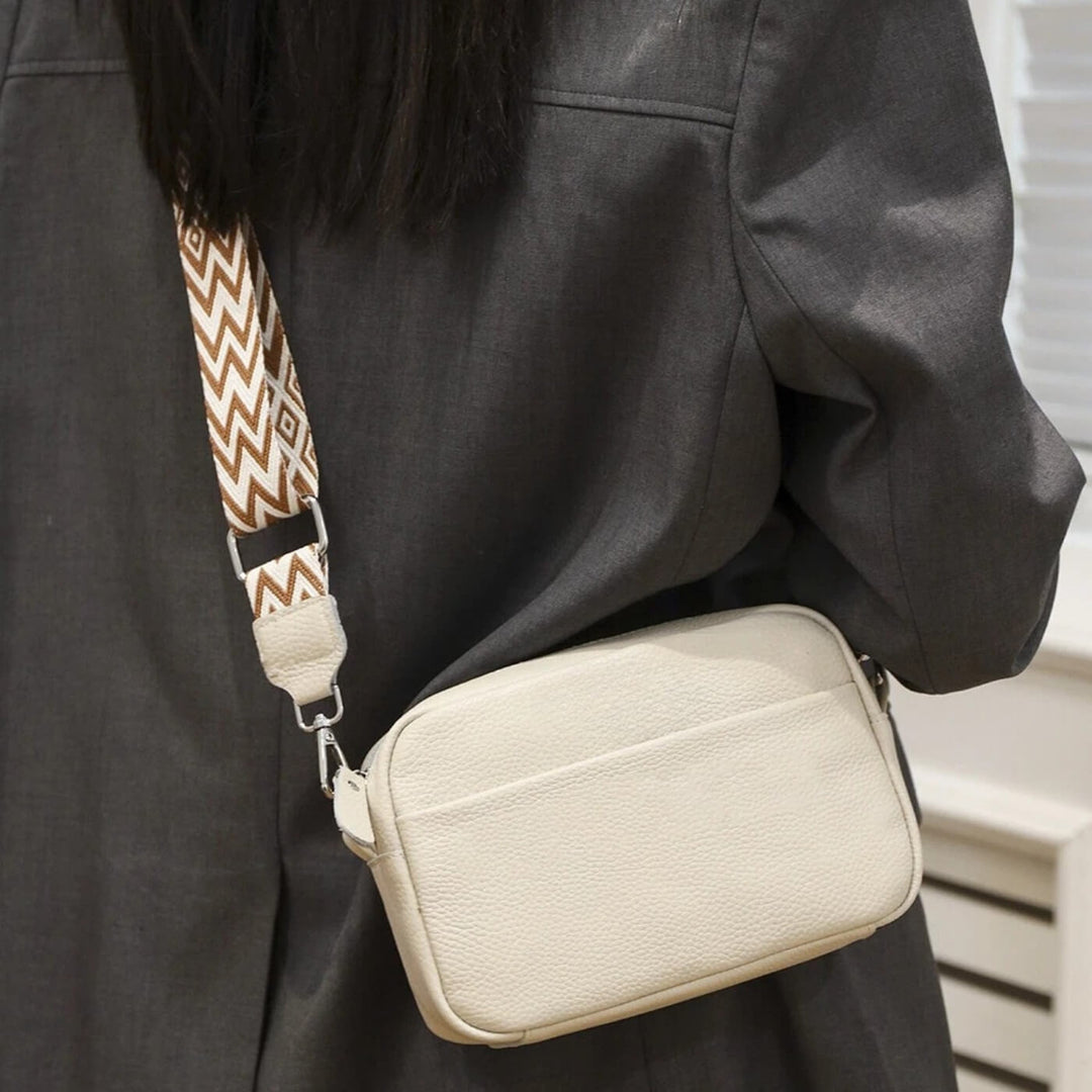 Vivi – Crossbodyväska med mönstrat axelband