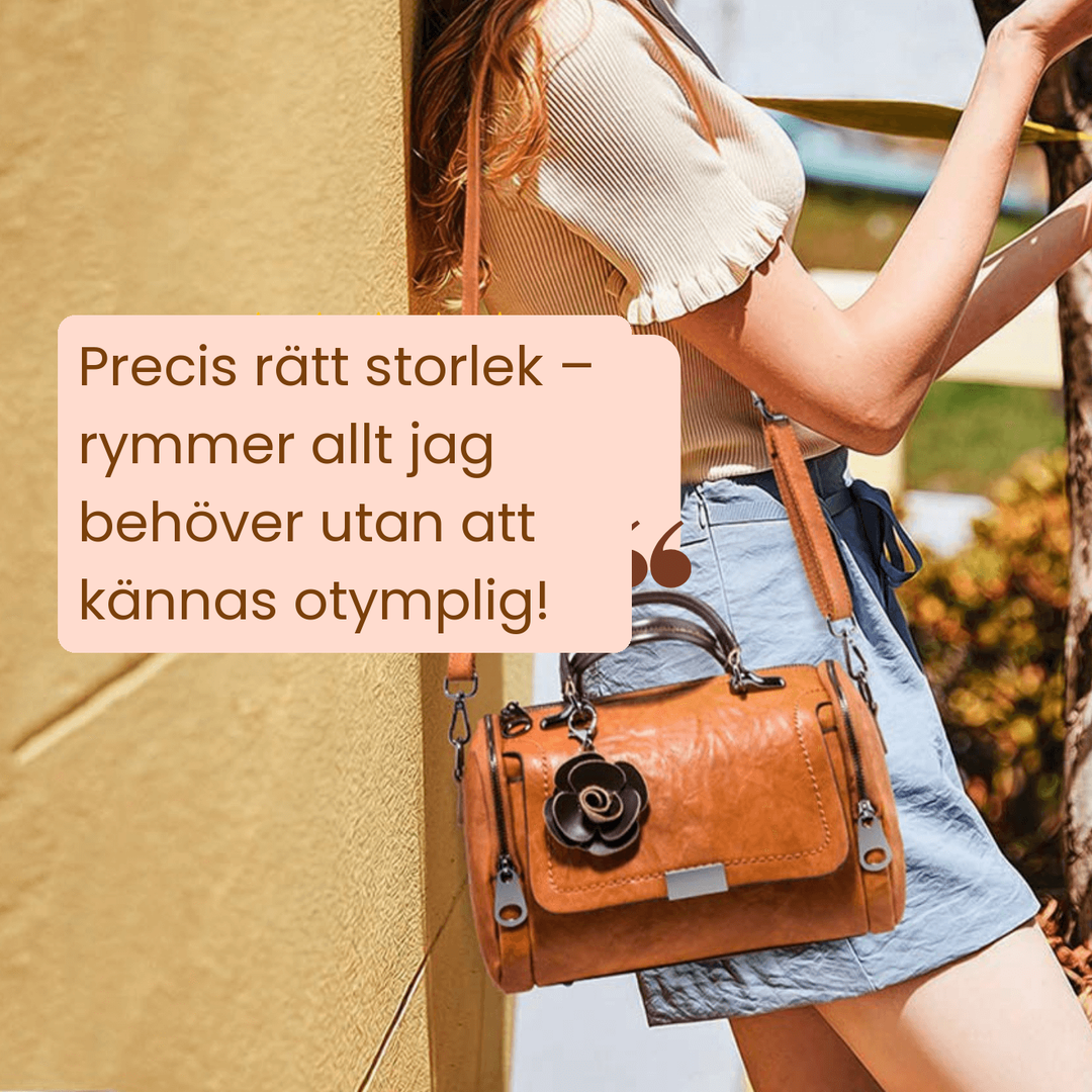 Bodil – Handväska med blomdetalj i läder