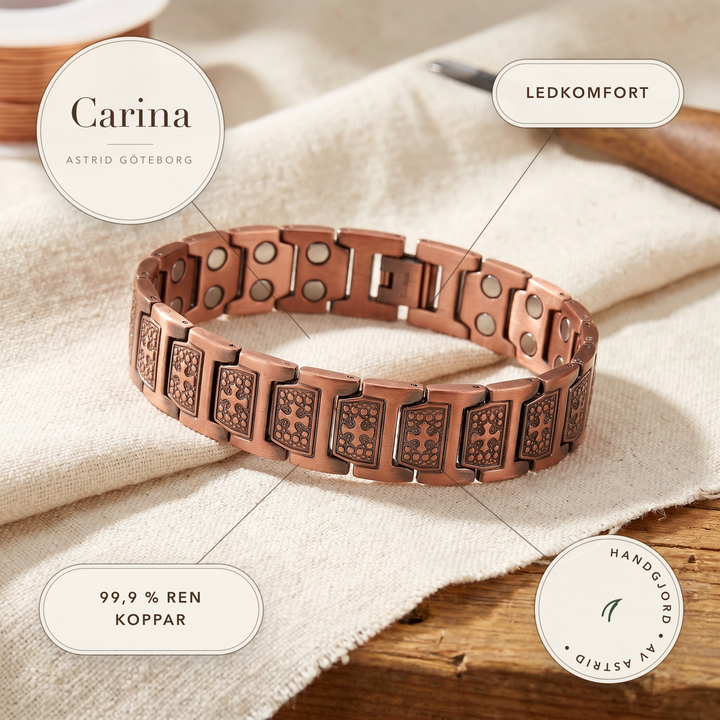 Carina – Brett koppararmband med präglat mönster