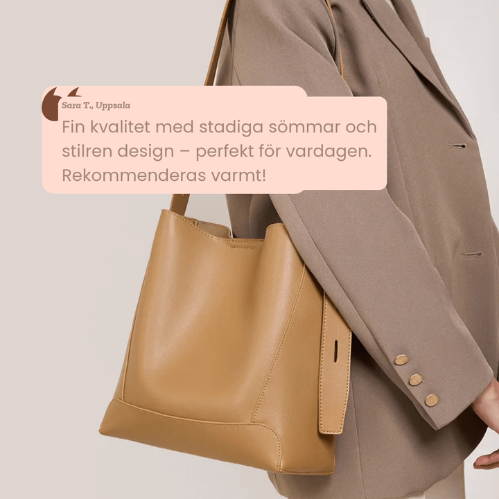 Lena – Rymlig axelväska i skinnlook
