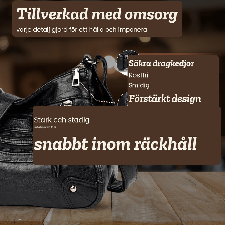 Maj – Axelväska med flera dragkedjefickor