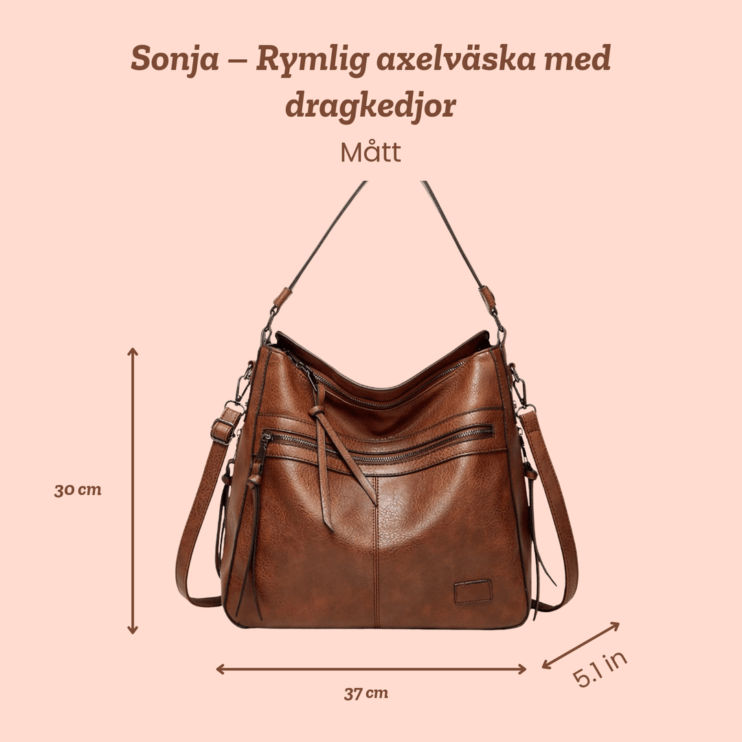 Sonja – Rymlig axelväska med dragkedjor