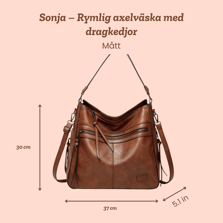 Sonja – Rymlig axelväska med dragkedjor